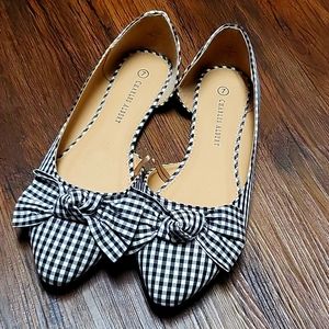 Charles Albert Ladies flats size 7.